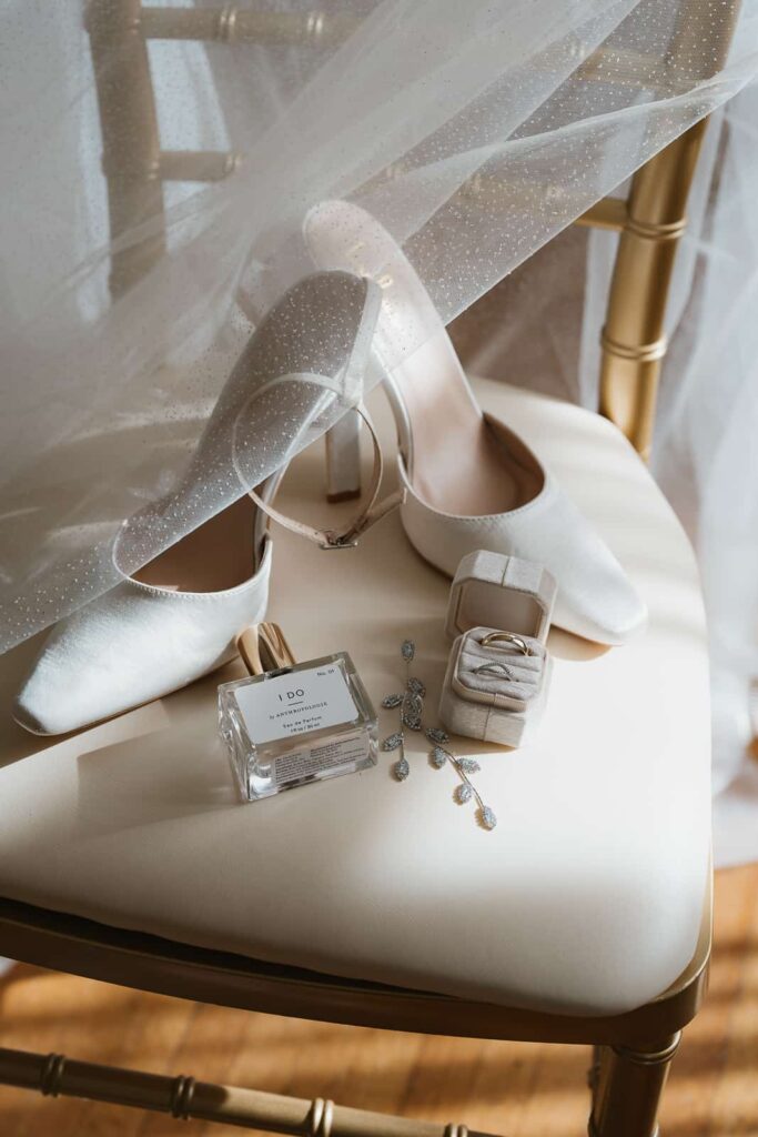 wedding details and flat lay at the hotel concord winter wedding