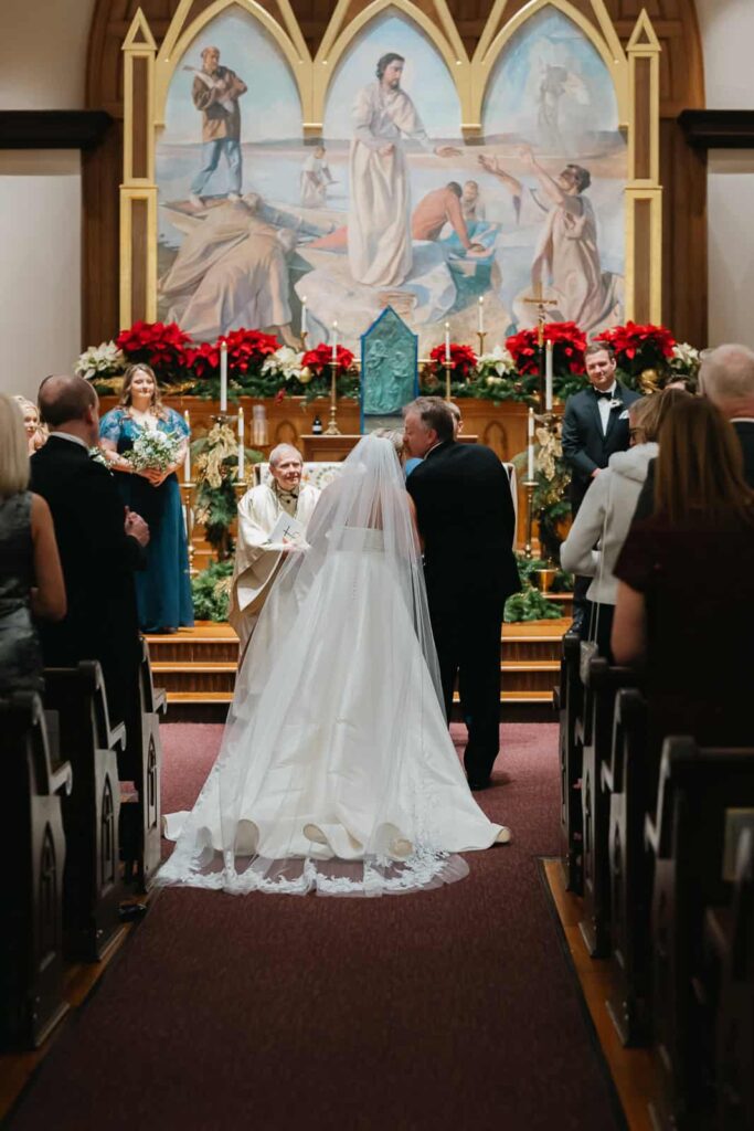 st peters catholic church father handing off bride to groom