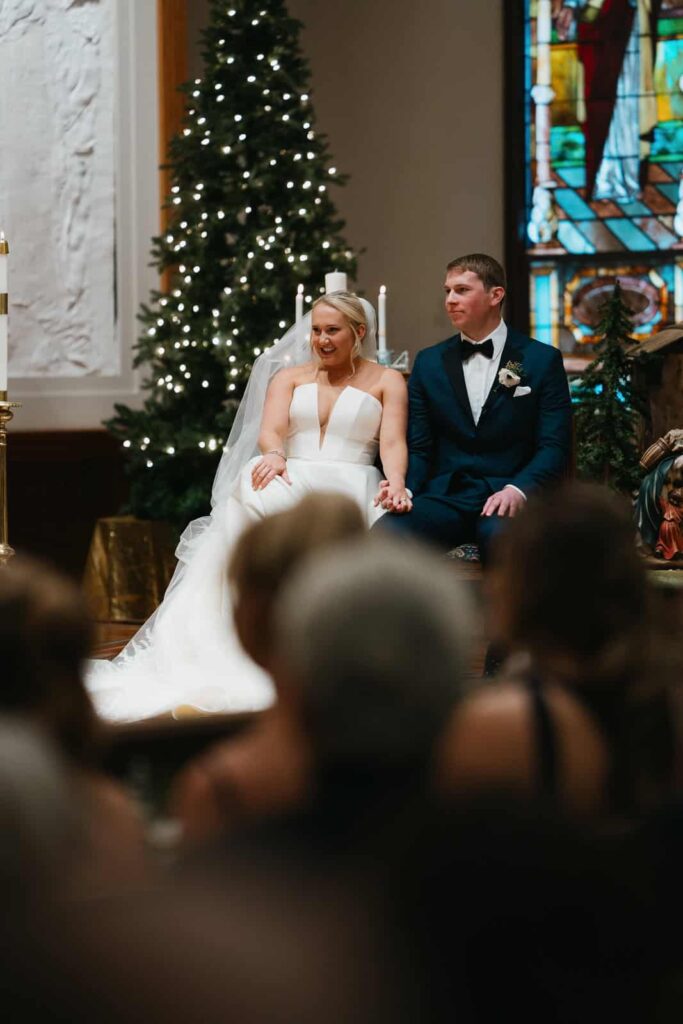 bride and groom wedding ceremony at st peters catholic church charlotte, nc