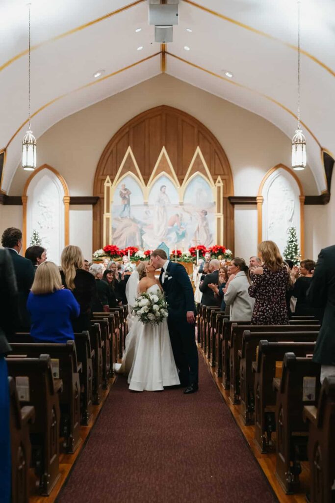 bride and groom wedding ceremony at st peters catholic church charlotte, nc