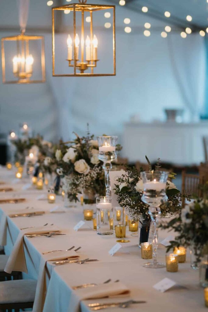 wedding details greenery and white roses tablescape at vanlandingham estate charlotte, nc